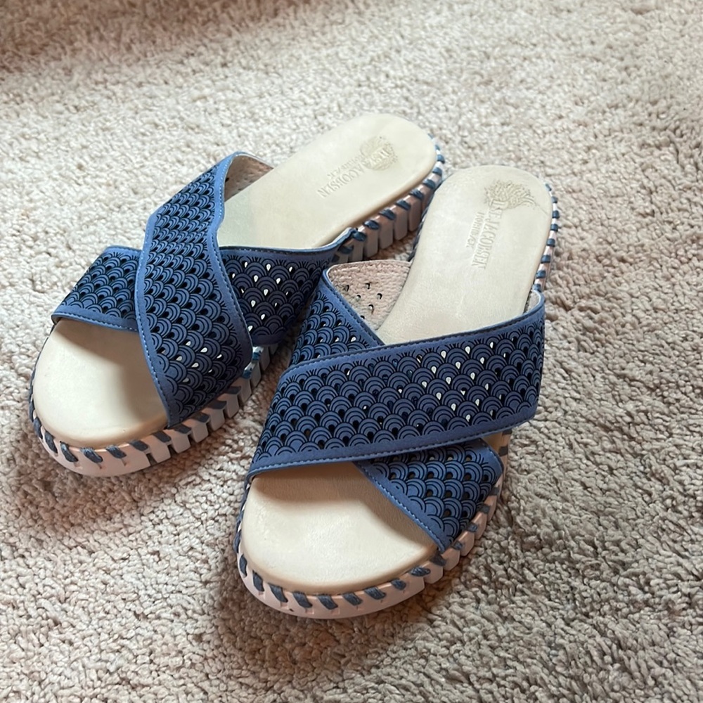 Beautiful, blue- rubber soled sandals. Never worn. Super soft & padded sole.